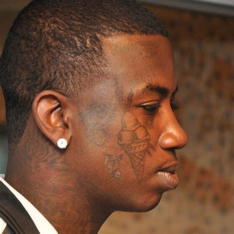 gucci mane face tattoo